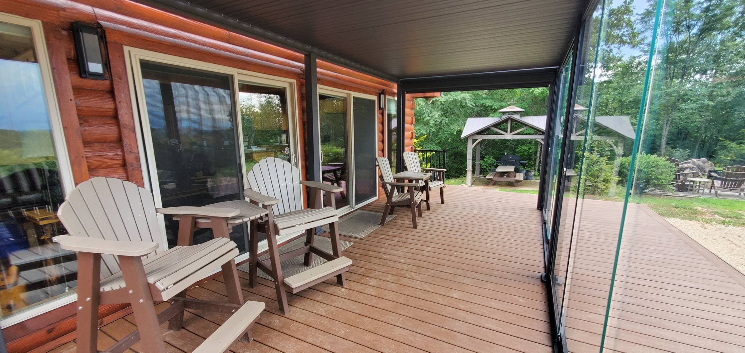 New 35x16ft covered deck with endless views and shade perfect for morning coffee sitting